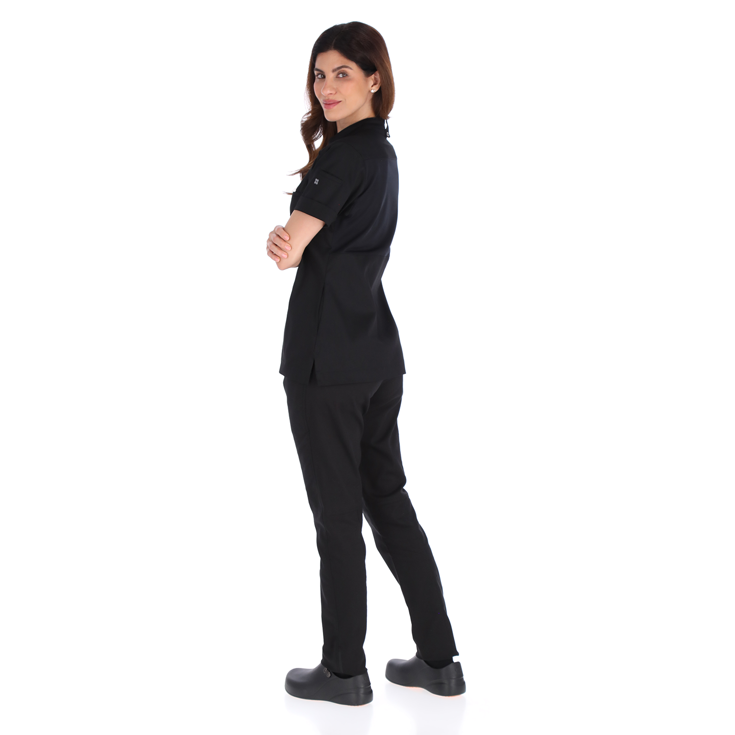 Back view of Unser black chef jacket showing ergonomic fit and refined stitching for professional kitchen wear.